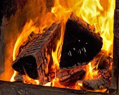 Burning logs in fireplace